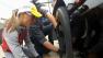 Woman breaks new ground in pit crew