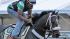 Exercise rider Rudy Quevedo trots Preakness Stakes entrant Oxbow for Hall of Fame trainer D. Wayne Lukas