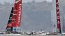 Emirates Team New Zealand, left, passes by Luna Rossa Challenge, right, of Italy, while training for the Americas Cup sailing event on Thursday, July 11, 2013, in San Francisco.