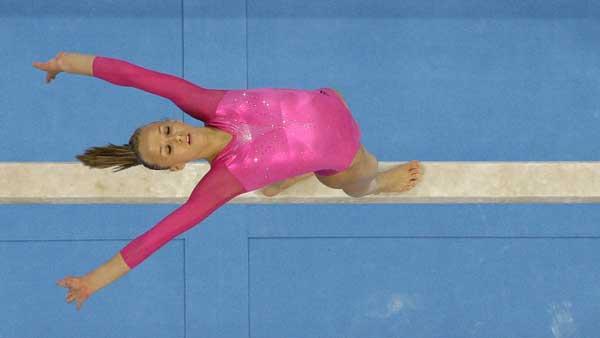 U.S. gymnast Nastia Liukin performs on the balance beam during the womens gymnastics individual all-around finals at the Beijing 2008 Olympics in Beijing, Friday, Aug. 15, 2008. (AP Photo/Rob Carr)