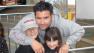 File -- This undated image provided Tuesday April 5, 2011 by John Stow shows Bryan Stow holding his 12-year-old son and 8-year-old daughter.