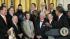 President Barack Obama, right, makes a comment...