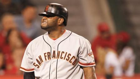 San Francisco Giants Pablo Sandoval reacts after striking out against the Los Angeles Angels during the seventh inning of a baseball game in Anaheim, Calif.