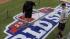 Last-minute preparations for World Series... :: Workers paint the field at AT&T Park after a workout for baseballs World Series Tuesday, Oct. 23, 2012, in San Francisco. The San Francisco Giants play the Detroit Tigers in Game 1 on Wednesday, Oct. 24. (AP Photo/Charlie Riedel)