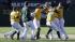 Oakland Athletics Nate Freiman, second from right, is mobbed by his teammates after hitting the game-winning RBI single off New York Yankees pitcher Mariano Rivera.