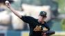 Oakland Athletics starting pitcher Dan Straily throws against the Los Angeles Angels in the first inning during a baseball game on Saturday, July 20, 2013, in Anaheim, Calif. (AP Photo/Alex Gallardo)