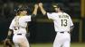 Oakland Athletics Jerry Blevins celebrates with catcher Stephen Vogt