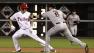 Philadelphia Phillies Cole Hamels is tagged out in a rundown by San Francisco Giants Brett Pill