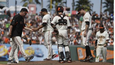 San Francisco Giants manager Bruce Bochy, left, takes the ball from pitcher Jose Mijares in the eighth inning of a baseball game against the Baltimore Orioles, Sunday, Aug. 11, 2013, in San Francisco. (AP Photo/Ben Margot)