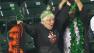 Longtime San Francisco Giants fan Virginia Smith catches a foul ball in the 9th inning.