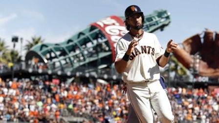 San Francisco Giants Angel Pagan, reacts after scoring a run on a double by Pablo Sandoval (48) against the San Diego Padres during the first inning of a baseball game on Saturday, Sept. 28, 2103, in San Francisco. (AP Photo/Tony Avelar)