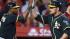 Oakland Athletics Brandon Moss, second from left, is congratulated by Alberto Callaspo, left, and Derek Norris, right, after hitting a three-run home run
