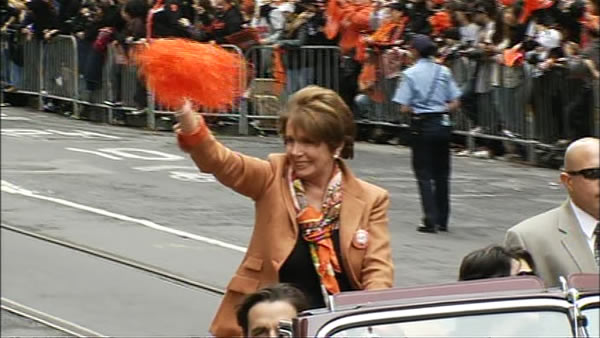 Nancy Pelosi waves to the crowd at the SF Giants...