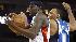 Golden State Warriors Anthony Morrow and Dallas Mavericks Shawn Marion fight for the ball.