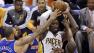 Indiana Pacers center Roy Hibbert, center right, is defended by New York Knicks center Tyson Chandler, left, and guard Raymond Felton