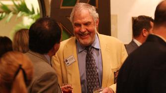 Merlin Olsen greets guests at the Pro Football Hall of Fame Luncheon in Ybor City, Fla. on Friday, Jan. 30, 2009.