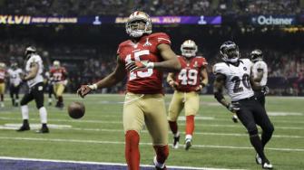 San Francisco 49ers wide receiver Michael Crabtree (15) reacts after scoring a 31-yard touchdown during the second half of the NFL Super Bowl XLVII football game against the Baltimore Ravens, Sunday, Feb. 3, 2013, in New Orleans. (AP Photo/Matt Slocum)