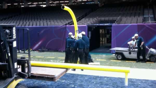 Crews at the Superdome tear down the goalpost following the San Francisco 49ers heartbreaking loss to the Baltimore Ravens in Super Bowl XLVII.