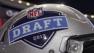 A helmet with the NFL football draft logo is placed on a table before the first round, Thursday, April 25, 2013, at Radio City Music Hall in New York. (AP Photo/Mary Altaffer)