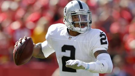 Oakland Raiders quarterback Terrelle Pryor (2) looks for a receiver during the first half of an NFL football game against the Kansas City Chiefs at Arrowhead Stadium in Kansas City, Mo., Sunday, Oct. 13, 2013. (AP Photo/Ed Zurga)