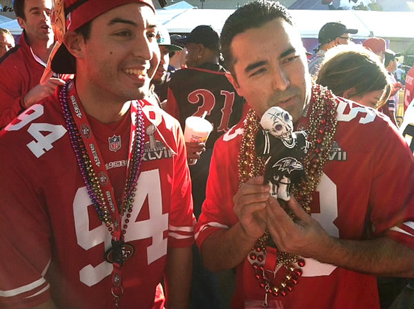 A 49ers fan gives a thumbs up.