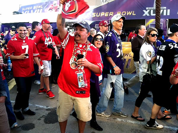A 49ers fan gives a thumbs up.