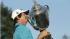 Jason Dufner holds up the Wanamaker Trophy after winning the PGA Championship golf tournament at Oak Hill Country Club, Sunday, Aug. 11, 2013, in Pittsford, N.Y. (AP Photo/Charlie Riedel)