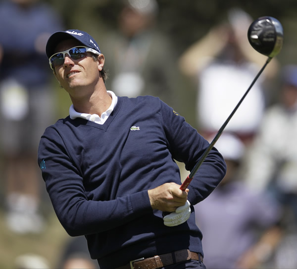 Nicolas Colsaerts, of Belgium, watches his drive...