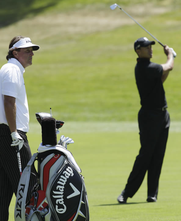 Phil Mickelson and Tiger Woods during the second...
