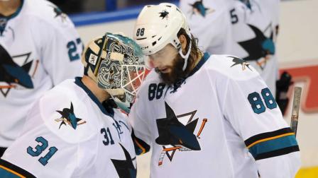 San Jose Sharks goalie Antti Niemi (31), of Finland, is congratulated by Brent Burns (88).