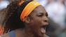 Serena Williams of the U.S. clenches her fist after scoring against Russias Maria Sharapova