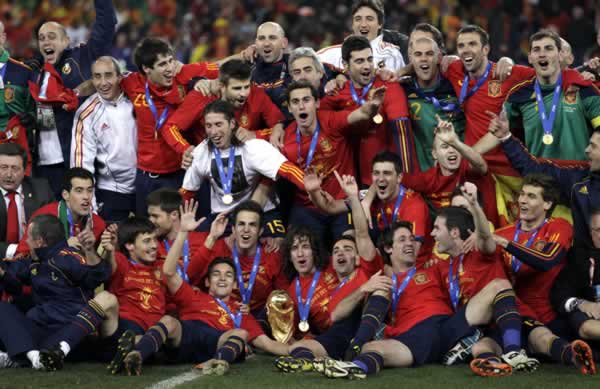 The Spanish team pose for photographers with the...