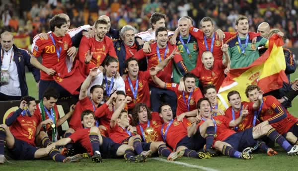 The Spanish team pose for photographers with the...