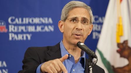 State Insurance Commissioner Steve Poizner speaks during a news conference.