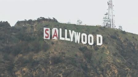Environmentalists are draping banners over the world-famous Hollywood sign, urging the public to Save the Peak.