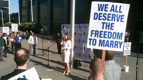 A speaker at a rally before the final day of the Prop 8 trial