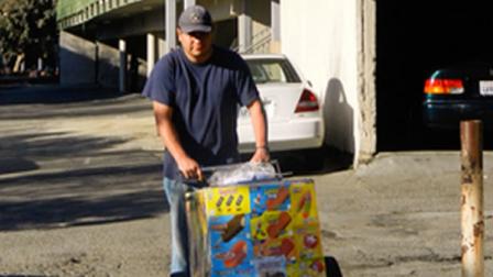 An ice cream vendor sells treats after school at in San Rafaels Canal area in Marin County.