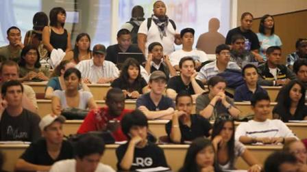 Students stand in the back row of a filled chemistry class at the California State University East Bay in Hayward, Calif., Wednesday, Sept. 23, 2009.
