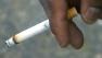 Hand holding cigarette