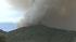 A wind-whipped wildfire near the main route into Yosemite forced the evacuation of about 150 houses and threatened others.