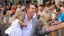 Holding his daughter Montana, California Lt. Gov. Gavin Newsom greets spectators during San Franciscos 43rd annual gay pride parade Sunday, June 30, 2013.