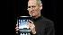 Apple CEO Steve Jobs shows off the new iPad...