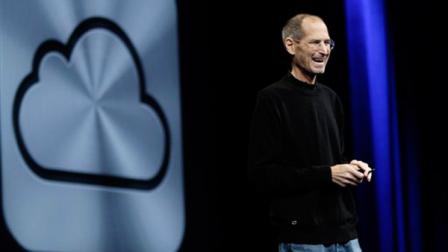 Apple CEO Steve Jobs introduces iCloud during a keynote address to the Apple Worldwide Developers Conference in San Francisco, Monday, June 6, 2011. (AP Photo/Paul Sakuma)