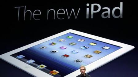 Apple CEO Tim Cook introduces the new iPad during an event in San Francisco, Wednesday, March 7, 2012.