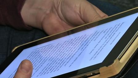 reading a book on an iPad