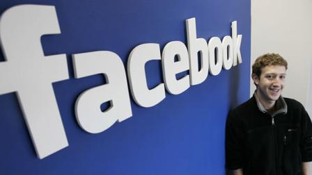 In this Feb. 5, 2007 file photo, Facebook CEO Mark Zuckerberg poses at his office in Palo Alto, Calif. (AP Photo/Paul Sakuma, File)