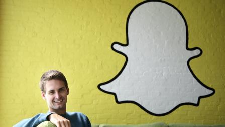 In this Thursday, Oct. 24, 2013, Snapchat CEO Evan Spiegel poses for photos