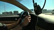 SmartPhone and commuter on the Bay Bridge