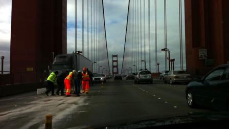 Two people suffered minor injuries in a five-car crash that  blocked traffic on the Golden Gate Bridge during the morning commute hour Tuesday.