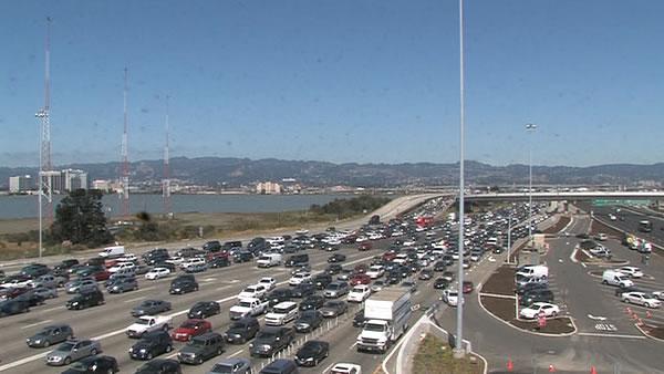 Traffic backs up at Bay Bridge Toll Plaza after CHP conducts rolling traffic breaks in both directions on the Bay Bridge, so they can investigate a suspicious device.





